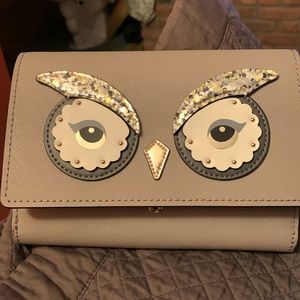 Beautiful details. Smooth finish grayish hue with hint of  purple